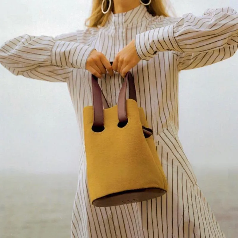 Niche retro circle hit color portable bucket bag