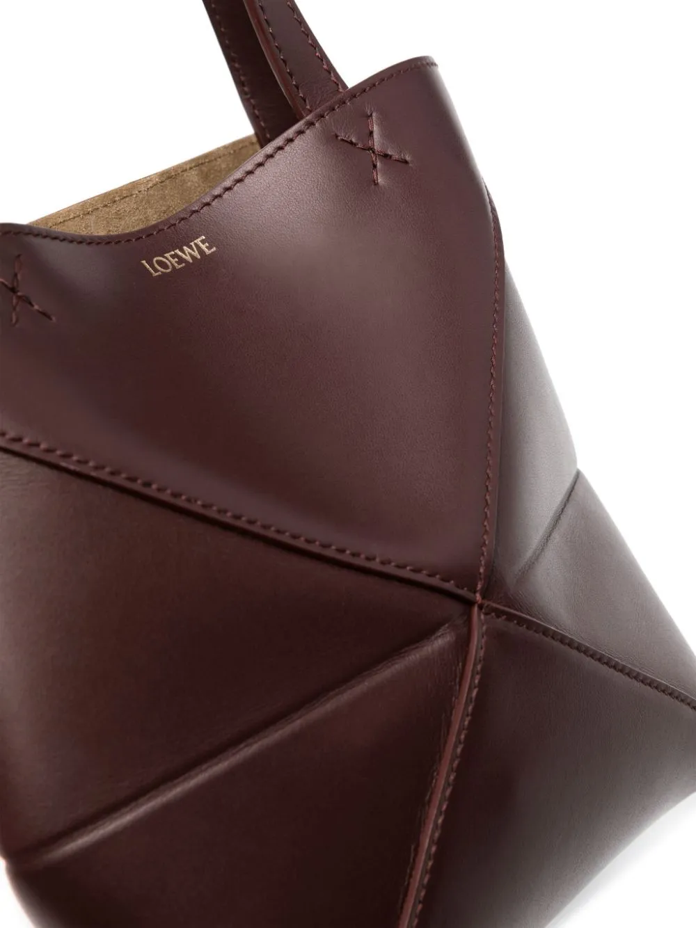 Puzzle fold mini leather tote